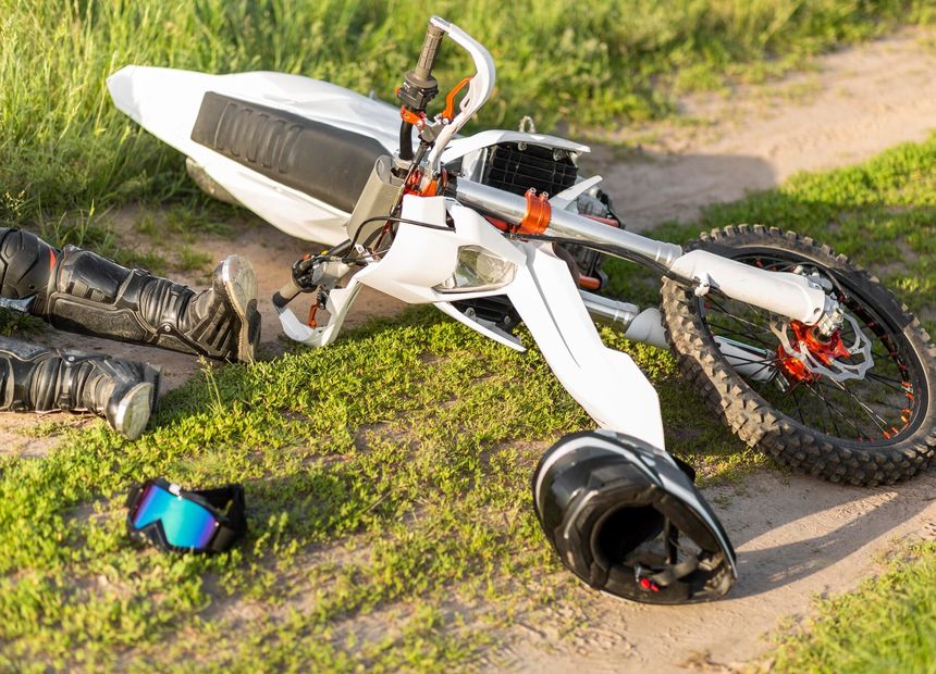 Motorcycle on its side after a crash